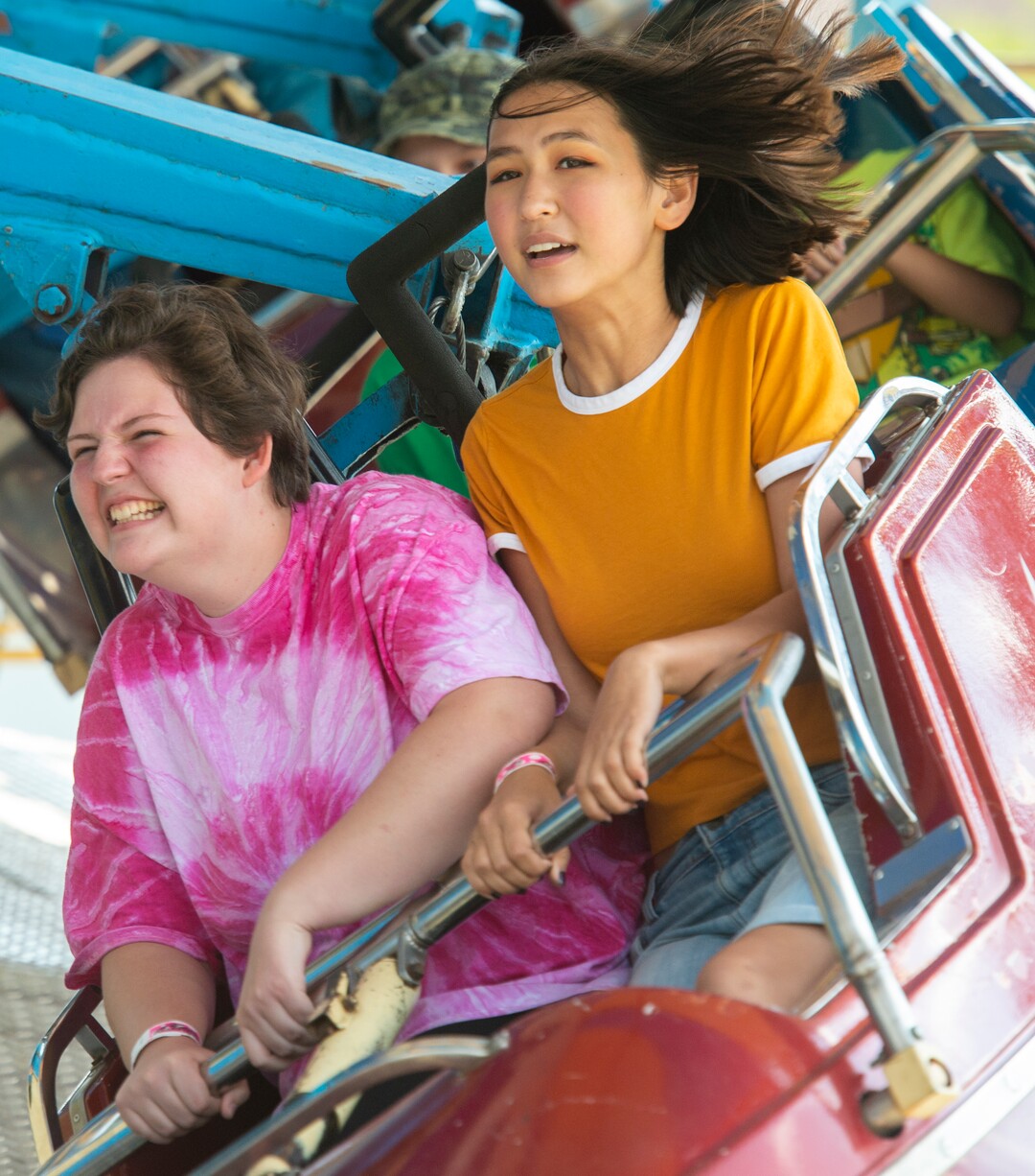 (Rick Egan  |  The Salt Lake Tribune)    Rae Are and Lexi Woodhouse door Saratoga Springs, take a ride on the midway at the Utah State Fair Monday, Sept. 9, 2019.