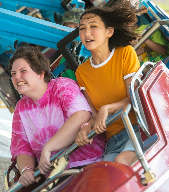 (Rick Egan  |  The Salt Lake Tribune)    
Rae Are and Lexi Woodhouse door Saratoga Springs, take a ride on the midway at the Utah State Fair Monday, Sept. 9, 2019.