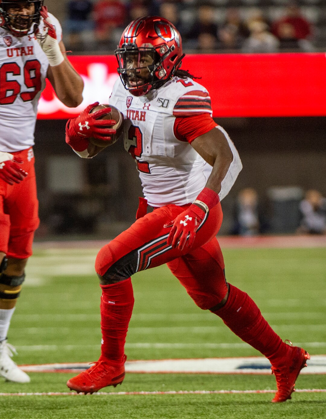(Rick Egan  |  The Salt Lake Tribune)      Utah Utes running back Zack Moss (2), runs the ball for the Utes, in PAC-12 action between the Utah Utes and the Arizona Wildcats in Tucson, Saturday, Nov. 23, 2019.