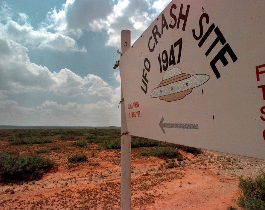 (Eric Draper | AP) A sign directs travelers to the start of the "1947 UFO Crash Site Tours" in Roswell, N.M., on June 10, 1997.