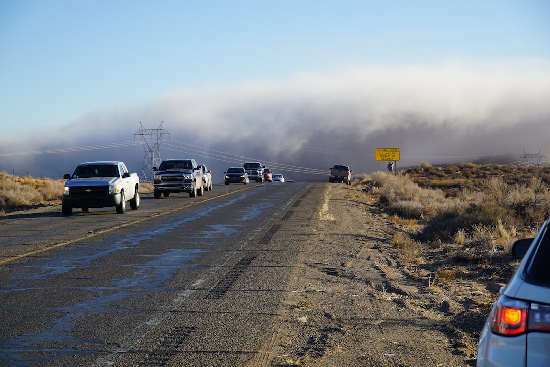 (Zak Podmore | The Salt Lake Tribune) Dust lingered in the air for hours after the demolition of smokestacks on the Navajo Generating Station on December 18, 2020.