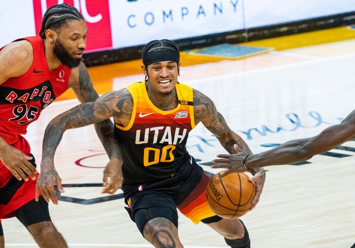 (Rick Egan | The Salt Lake Tribune) Utah Jazz guard Jordan Clarkson (00) Tries to get by Toronto Raptors guard DeAndre' Bembry (95), in NBA action between the Utah Jazz and the Toronto Raptors at Vivint Arena, on Saturday, May 1, 2021.