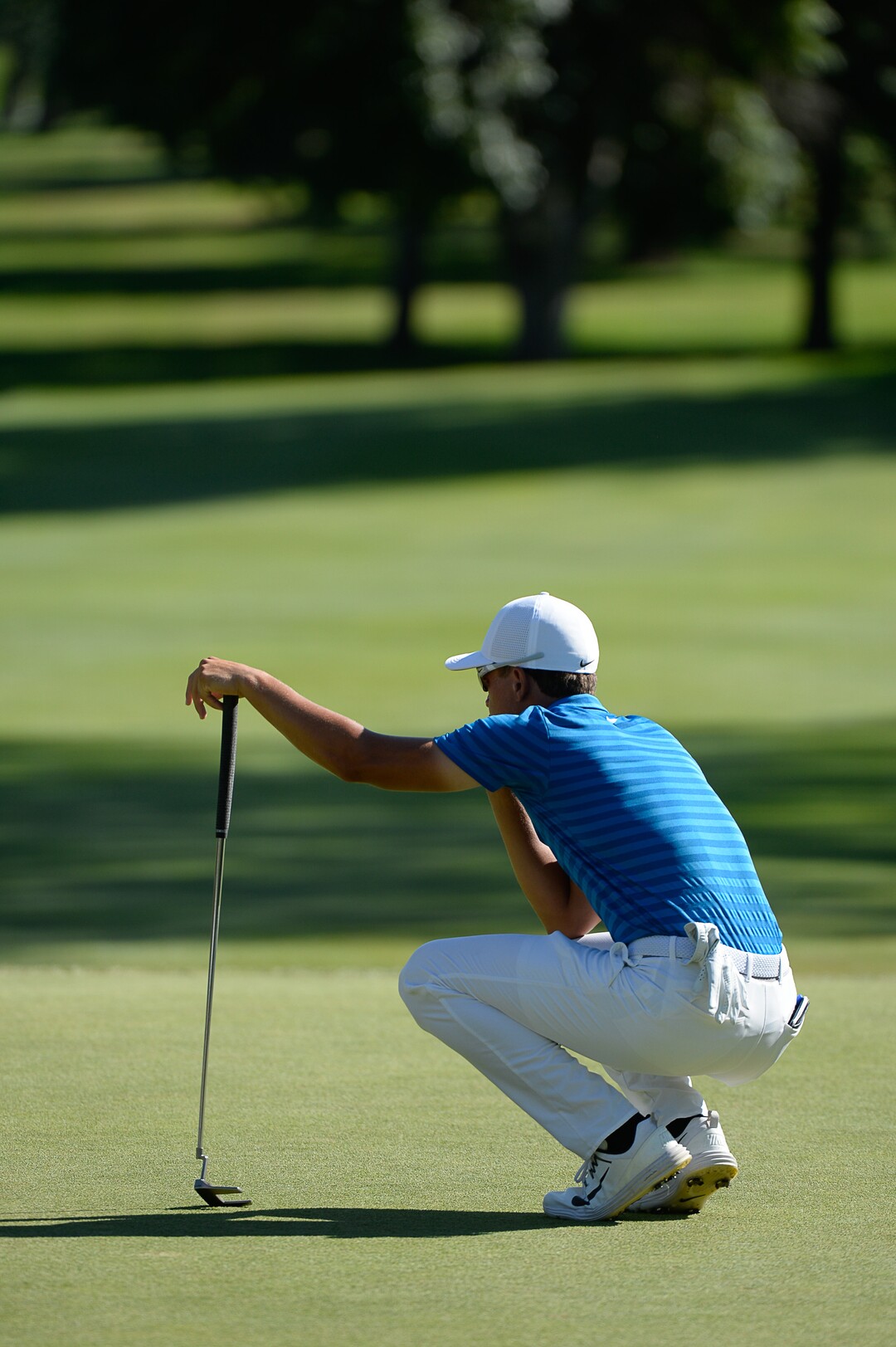 (Francisco Kjolseth  |  The Salt Lake Tribune)  Cameron Champ from Sacramento, CA, eyes a putt during the Utah Championship golf event on the Web.com Tour at Oakridge Country Club in Farmington on Sunday, July 15, 2018, on his way to winning the championship. 
