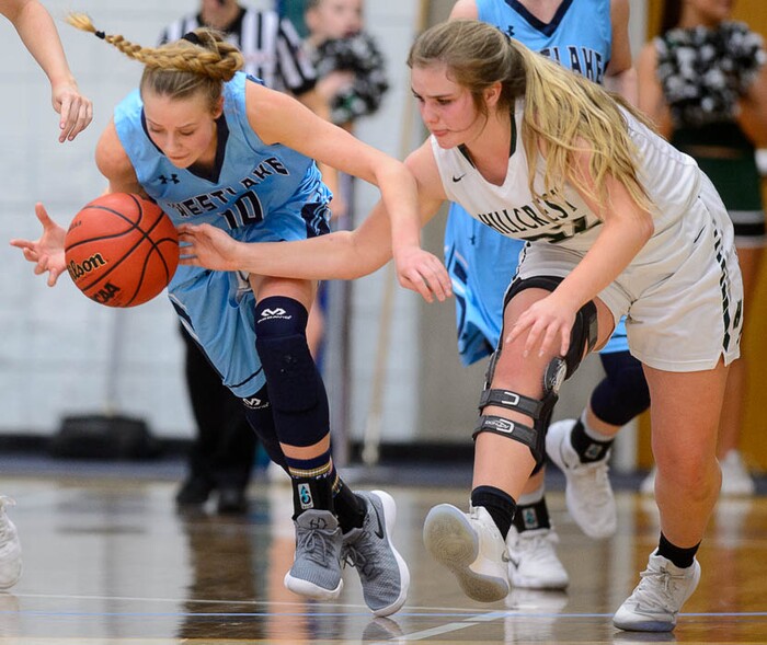 (Trent Nelson | The Salt Lake Tribune)  Westlake's Samantha Hester (10) and Hillcrest's Amanda Means (32) as Hillcrest faces Westlake in the 6A High School Girls' Basketball Tournament at SLCC in Taylorsville, Thursday Feb. 22, 2018.