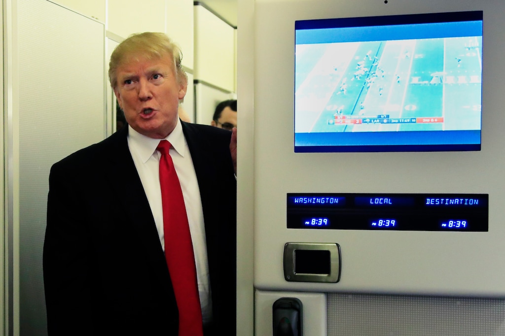 FILE - In this Sunday, Feb. 3, 2019 file photo, President Donald Trump speaks to reporters onboard Air Force One, on his way back to the White House in Washington from a weekend at his Mar-a-Lago estate in Palm Beach, Fla. Iraq's President Barham Salih spoke Monday at a forum in Baghdad slamming comments by Trump in which he said he wants to keep U.S. troops in Iraq "to watch Iran." Salih said the U.S. president did not ask Iraq's permission for American troops stationed there to watch Iran. He said the Iraqi constitution forbids the use of Iraq as a base to threaten the interests or security of neighboring countries. (AP Photo/Manuel Balce Ceneta, File)