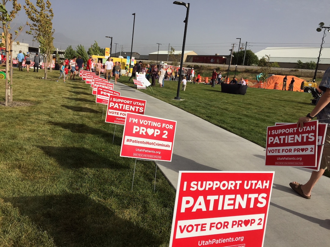 (The Salt Lake Tribune | Kathy Stephenson) Supporters of Proposition 2 picked up T-shirts and lawn signs during a kick-off rally in Midvale.