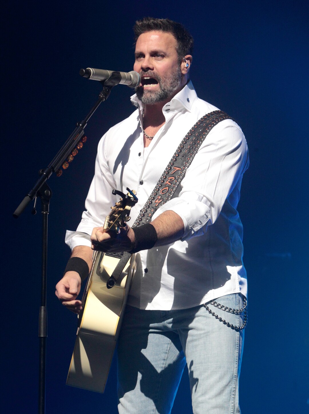 FILE - In this Jan. 17, 2013 file photo, Troy Gentry of the Country Music duo Montgomery Gentry performs on the Rebels On The Run Tour in Lancaster, Pa. Gentry, one half of the award-winning country music duo Montgomery Gentry, died Friday, Sept. 8, 2017, in a helicopter crash, according to a statement from the band’s website. He was 50.  The group was supposed to perform Friday at the Flying W Airport & Resort in Medford, N.J. (Photo by Owen Sweeney/Invision/AP, File)