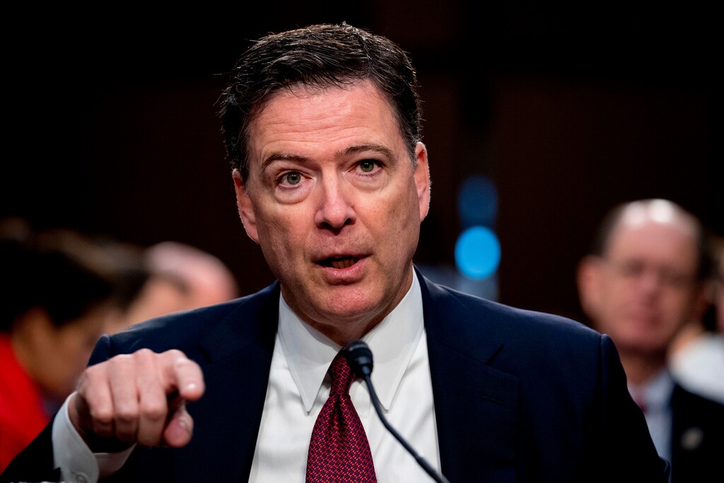 FILE - In this Thursday, June 8, 2017, file photo, former FBI director James Comey speaks during a Senate Intelligence Committee hearing on Capitol Hill, in Washington. A published report says President Donald Trump told his counsel’s office last spring he wanted to prosecute political adversaries Hillary Clinton and Comey. The New York Times says the idea prompted White House lawyers to prepare a memo warning of consequences ranging up to possible impeachment (AP Photo/Andrew Harnik, File)