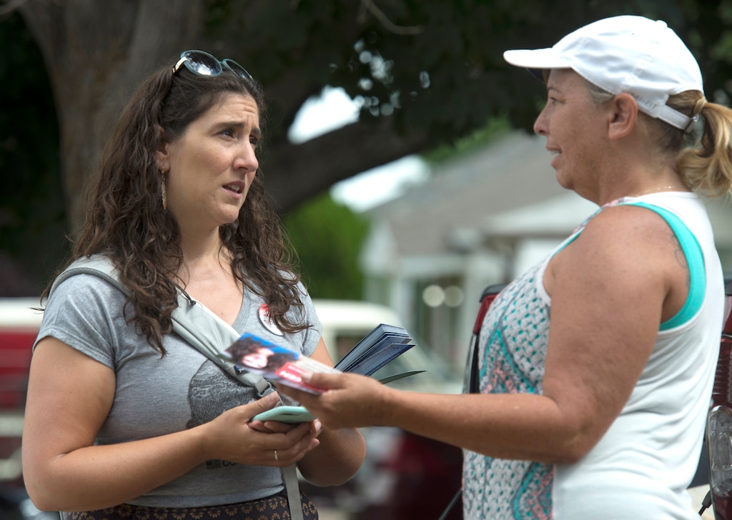 (Rick Egan  |  The Salt Lake Tribune)  Second Congressional District candidate Shireen Ghorbani talks to Vonie Martin, while knocking on doors in Tooele, Saturday, July 7, 2018.