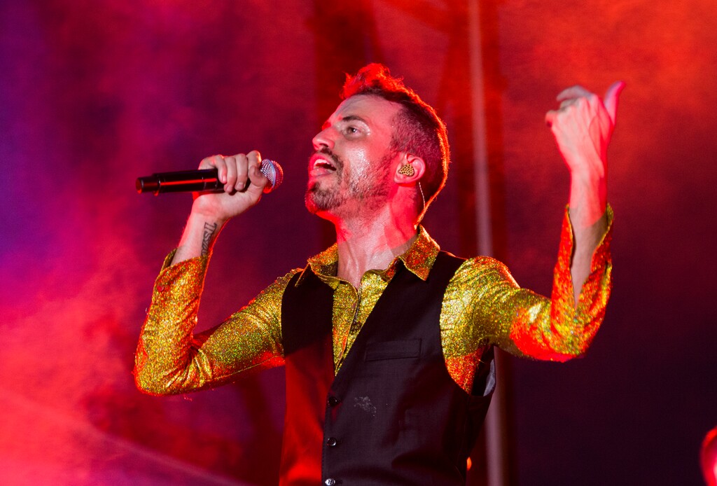 (Rick Egan  |  The Salt Lake Tribune)  Tyler Glenn Sings for Neon Trees, at the LoveLoud Festival at Brent Brown Ballpark at UVU campus, Saturday, Aug. 26, 2017.