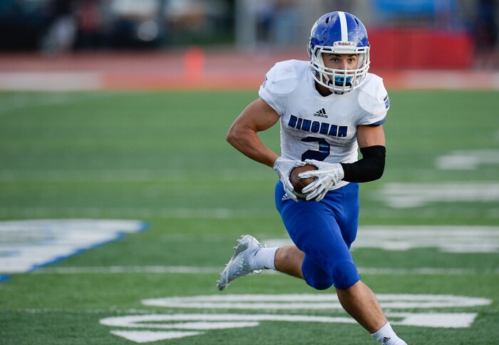 (Francisco Kjolseth  |  The Salt Lake Tribune)  Bingham's Andrew Wimmer runs in his team's third touchdown against East in the second quarter of their game at East on Friday, Aug. 24, 2018.