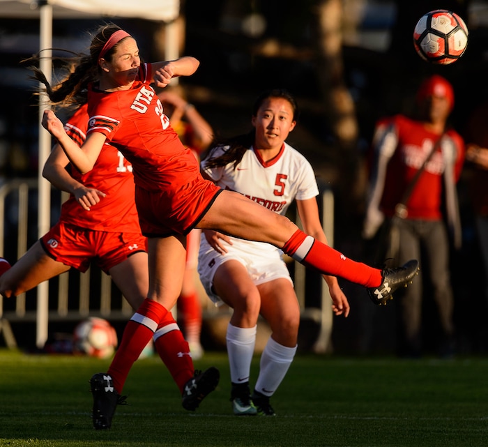 (Trent Nelson | The Salt Lake Tribune) Utah's Natalee Wells (28) defends a kick by Stanford's Michelle Xiao (5) as the University of Utah hosts Stanford, NCAA Women's Soccer in Salt Lake City Thursday October 5, 2017.
