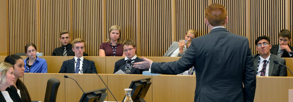 (Al Hartmann  |  The Salt Lake Tribune)
BYU law student Joshua Prince acts as prosecutor in a mock trial in Judge David Nuffer's federal courtroom in Salt Lake City on Wednesday, Aug. 22. High school students listen from the jury box as part of Civics, Law and Leadership Camp. The camp, hosted by Brigham Young University’s J. Reuben Clark Law School and the Federal Bar Association, is designed to prepare youths for civic leadership and service.