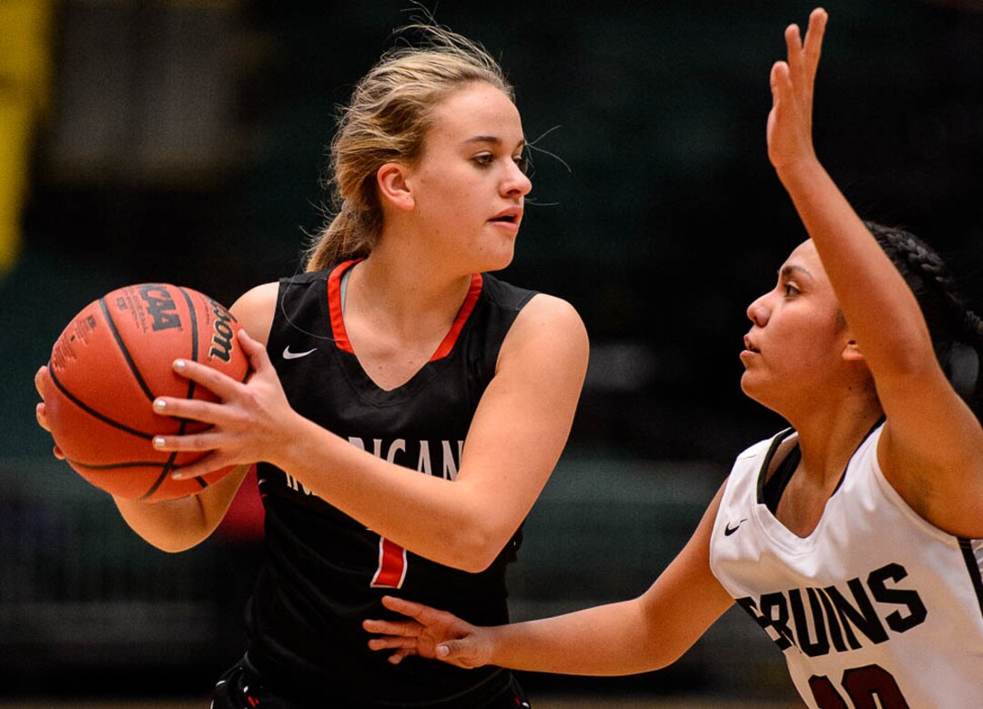 (Trent Nelson | The Salt Lake Tribune)  Hurricane vs. Mountain View, 4A State high school basketball tournament at Utah Valley University in Orem, Thursday March 1, 2018. Hurricane's Kailee Yardley (1) and Mountain View's Sam Eddy (10).