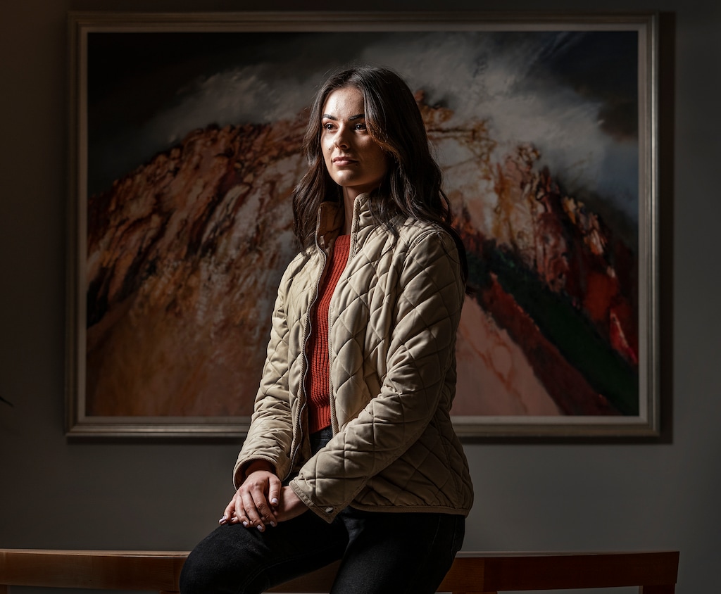 (Leah Hogsten | The Salt Lake Tribune) Kaytriauna Flint poses for a photograph in her attorney's office, Dec. 13, 2021. She has settled her case against Utah State University.
