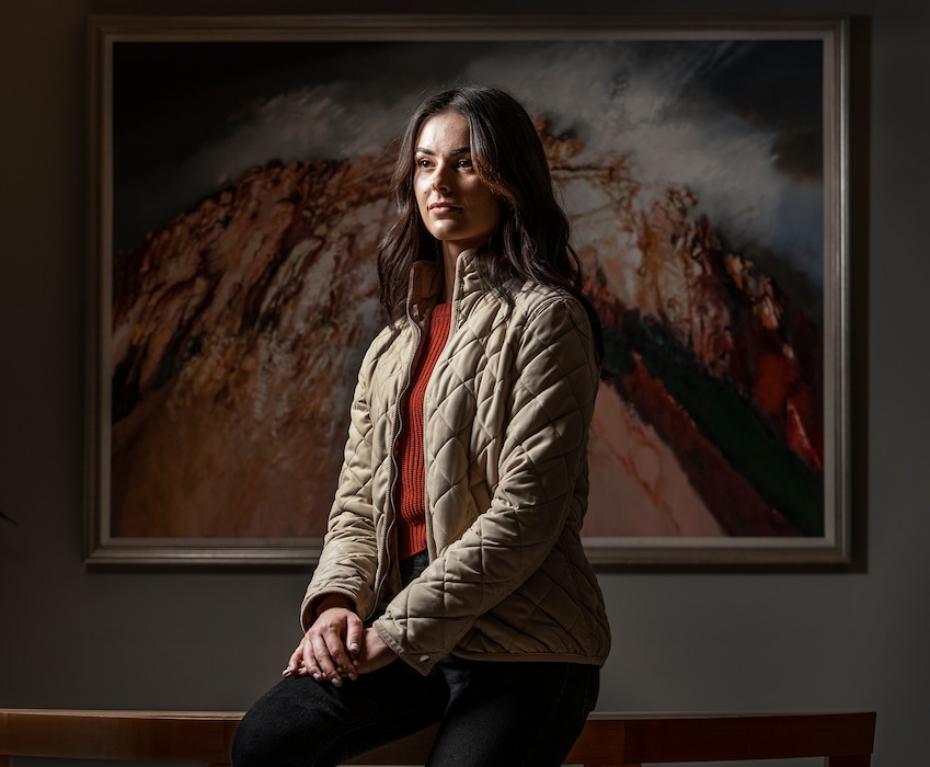 (Leah Hogsten | The Salt Lake Tribune) Kaytriauna Flint poses for a photograph in her attorney's office, Dec. 13, 2021. She has settled her case against Utah State University.