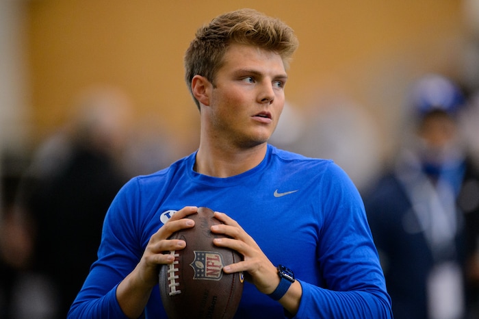 (Trent Nelson | The Salt Lake Tribune) BYU quarterback Zach Wilson warms up before working out for NFL scouts during BYU Pro Day, in Provo on Friday, March 26, 2021.