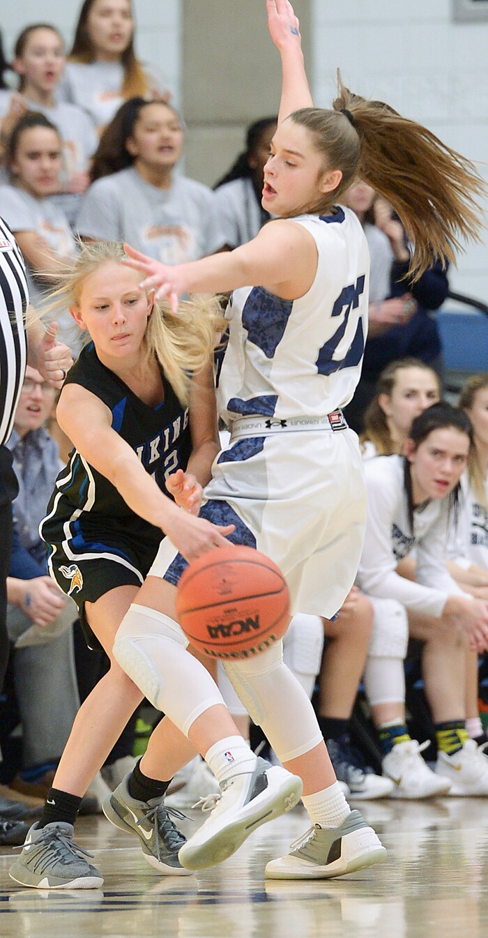 (Leah Hogsten  |  The Salt Lake Tribune)   Copper Hills High School girls' basketball team defeated Pleasant Grove High School 66-25 during their Class 6A girls' basketball playoff opener at Salt Lake Community College Tuesday, Feb. 20, 2018. 