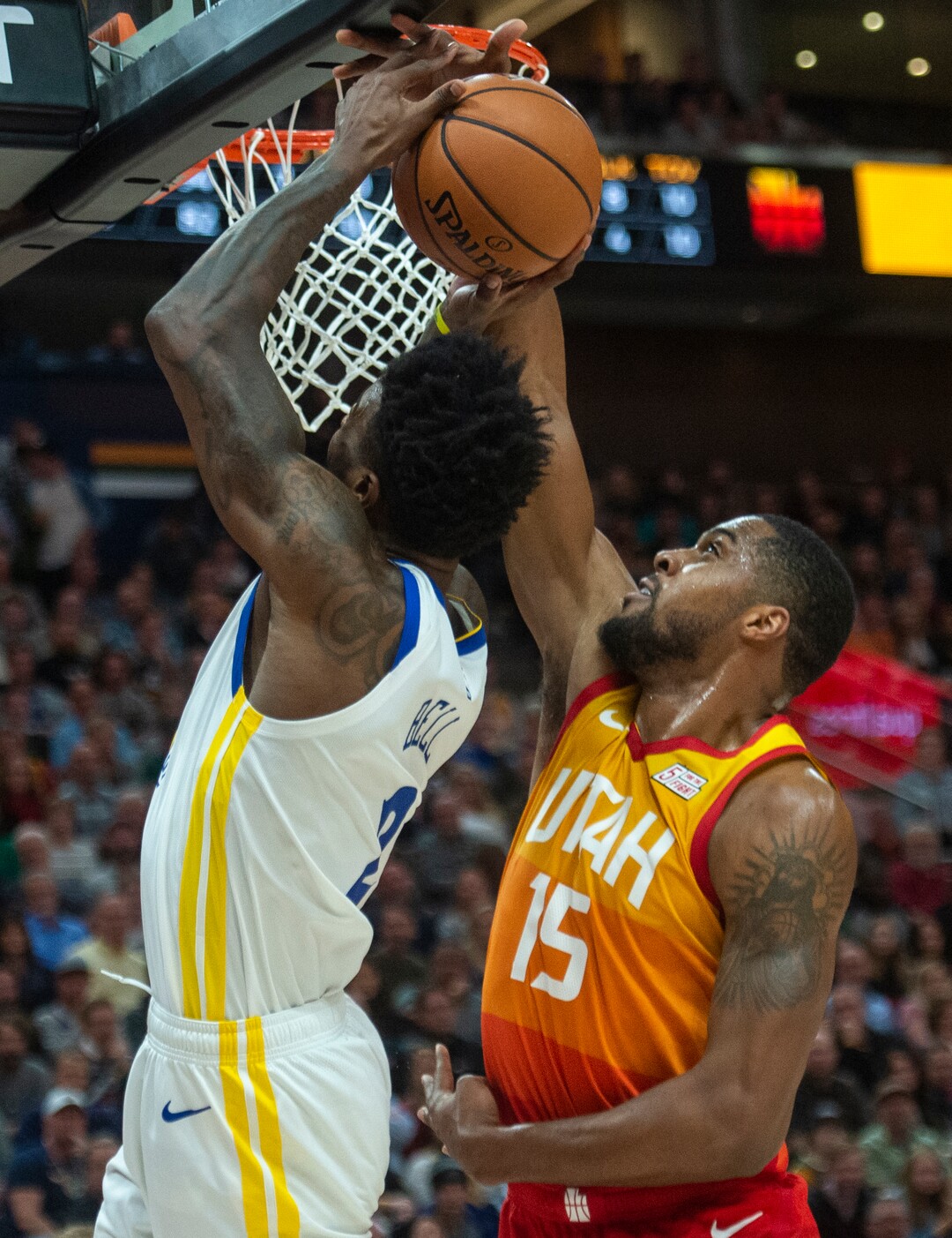 (Rick Egan  |  The Salt Lake Tribune)    Utah Jazz forward Derrick Favors (15) blocks a shot by Golden State Warriors forward Jordan Bell (2), in NBA action between Utah Jazz and Golden State Warriors, in Salt Lake City, Wednesday, Dec. 19, 2018.