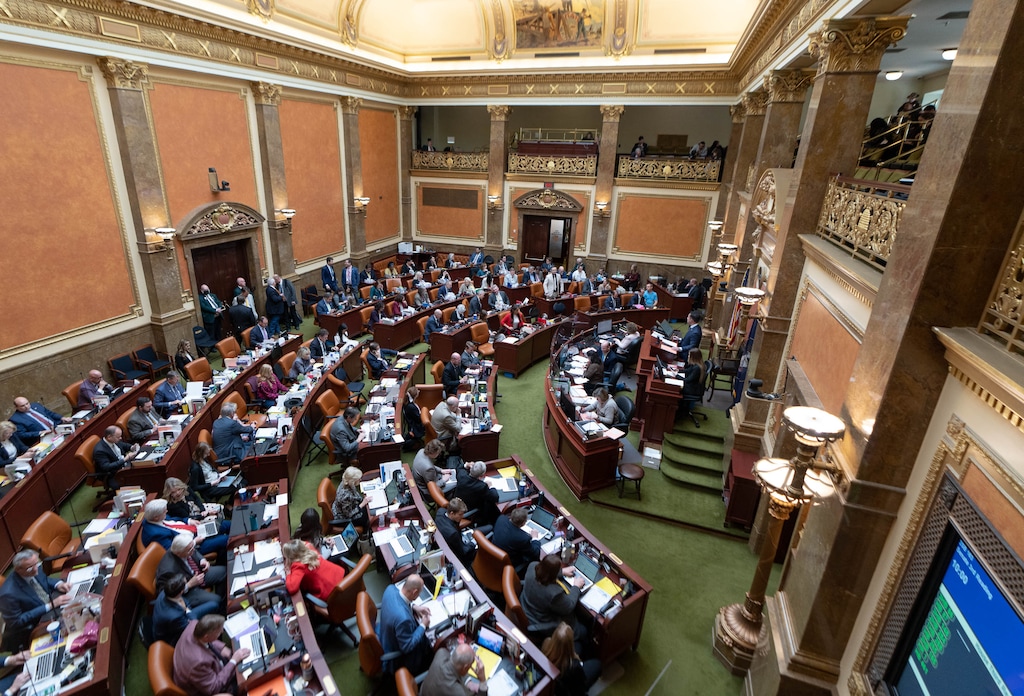 (Francisco Kjolseth | The Salt Lake Tribune) Representatives work on the house floor at the Capitol in Salt Lake City on Friday, March 4, 2022, during the final day of the Utah Legislature’s 2022 general session. During an interim committee meeting on Nov. 15, 2022, members of the Legislative Management Committee voted to submit an amicus brief opposing the injunction on the state’s abortion trigger law.