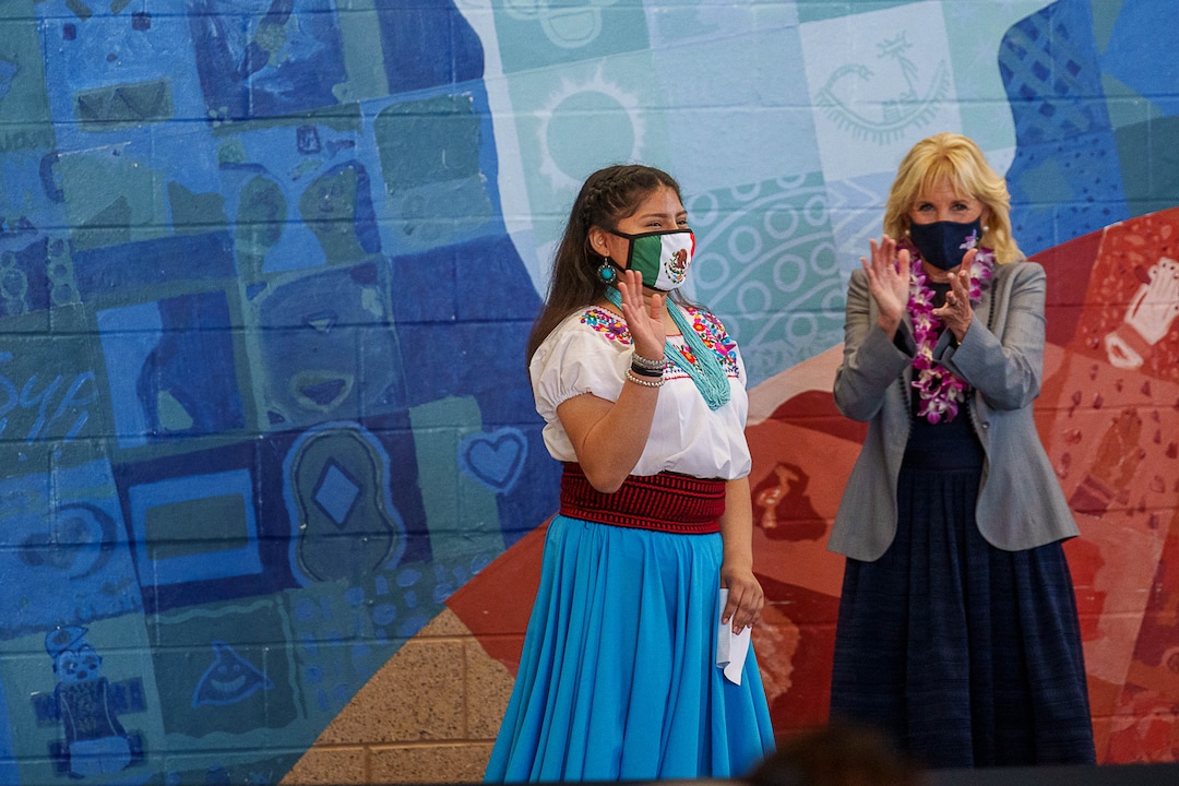 (Trent Nelson  |  The Salt Lake Tribune) First lady Jill Biden, right, applauds student Rosa Sanchez Garcia, at Glendale Middle School in Salt Lake City on Wednesday, May 5, 2021.