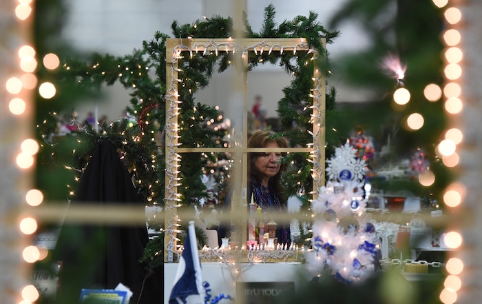 (Francisco Kjolseth  |  The Salt Lake Tribune)  People tour the Festival of Trees at the South Towne Exposition Center in Sandy on Friday, Dec. 1, 2017. The annual festival which runs through Saturday raises money for children at Primary Children's Hospital.