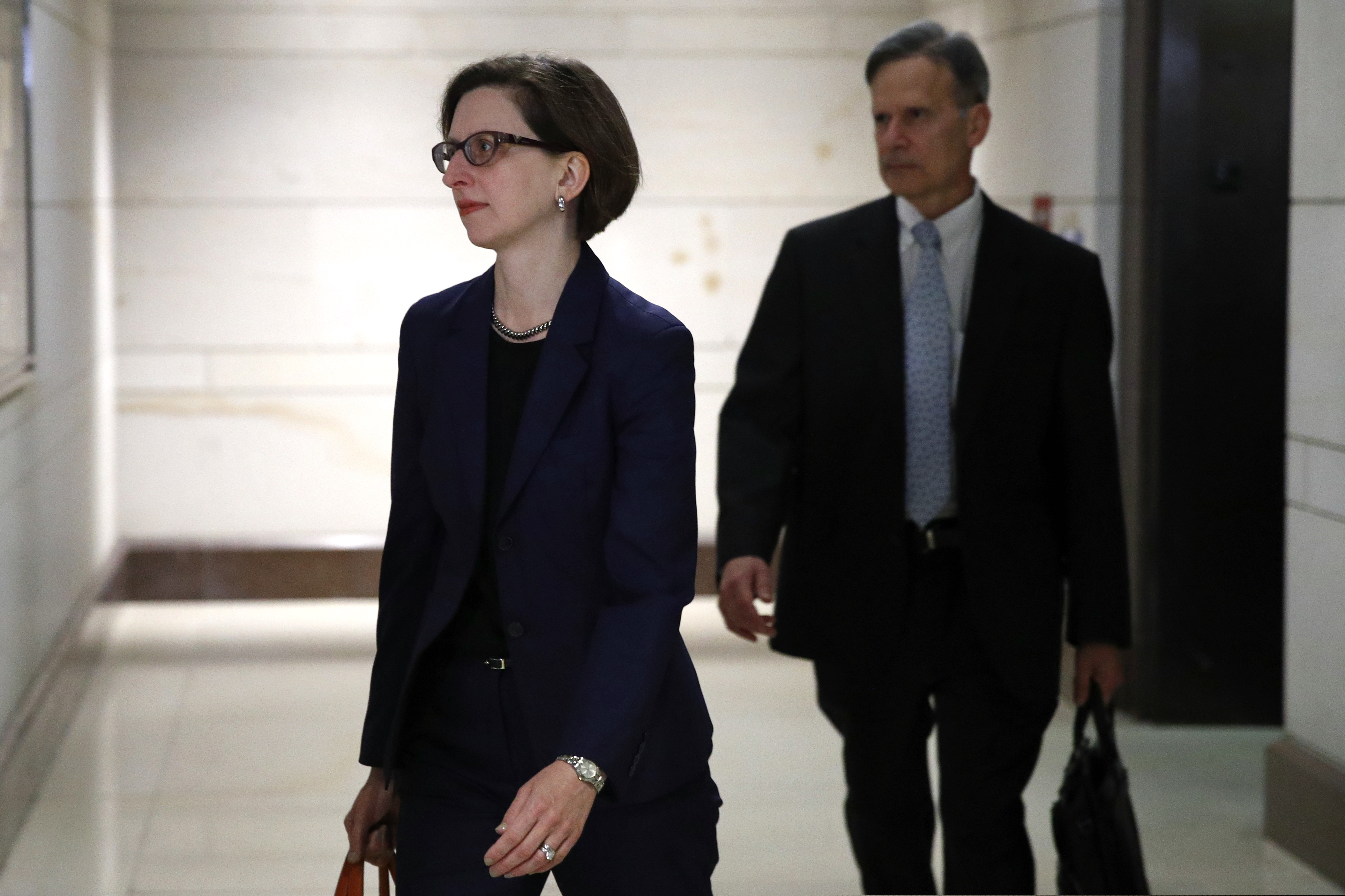 (Patrick Semansky | AP file photo) Deputy Assistant Secretary of Defense Laura Cooper, left, arrives to review her testimony as part of the House impeachment inquiry into President Donald Trump, Wednesday, Oct. 30, 2019, on Capitol Hill in Washington.