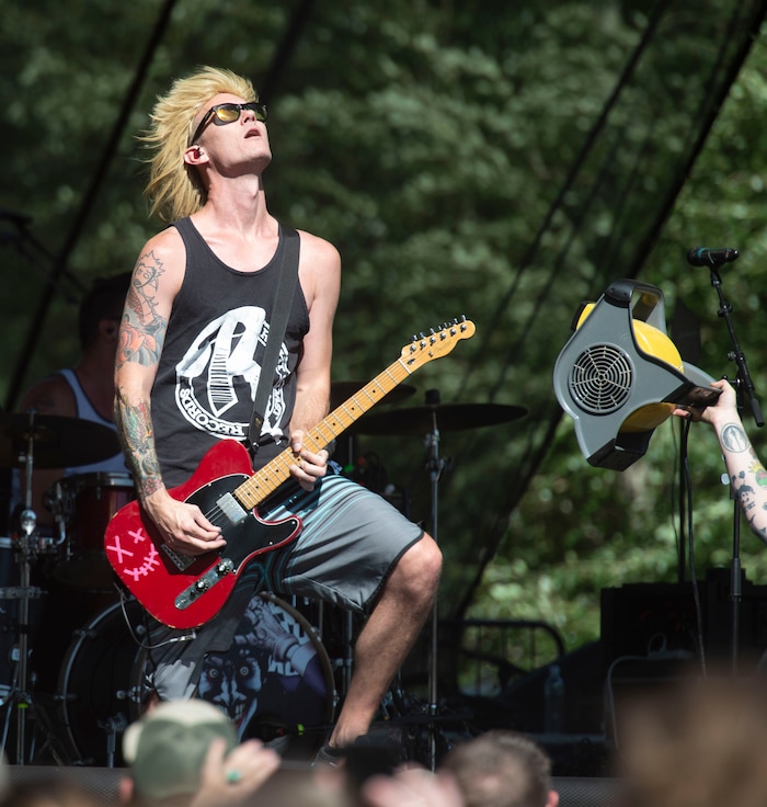 (Rick Egan  |  The Salt Lake Tribune)  Howi Spangler plays guitar for Ballyhoo! At the Reggae Rise Up music Festival, at the Rivers Edge near Heber City, Saturday, Aug. 24, 2019.