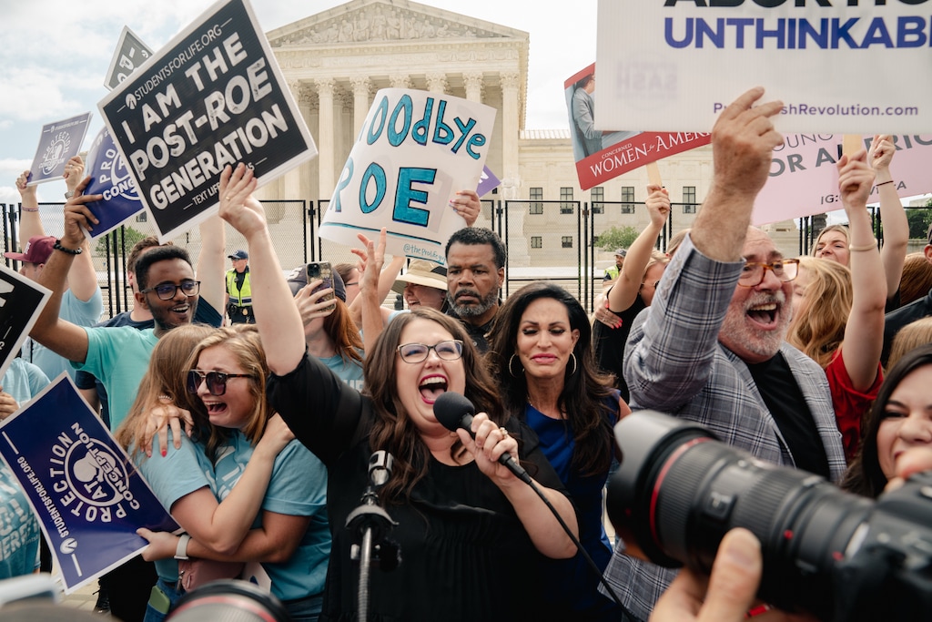 (Shuran Huang | The New York Times) Anti-abortion demonstrators celebrate outside the Supreme Court in Washington on Friday, June 24, 2022. The Supreme Court on Friday overruled Roe v. Wade, eliminating the constitutional right to abortion after almost 50 years.