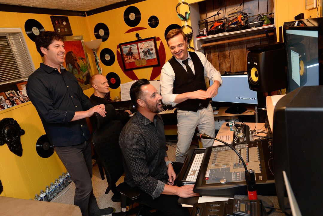 (Francisco Kjolseth  |  The Salt Lake Tribune)  Members of The Piano Guys musical group, including videographer Paul Anderson, pianist Jon Schmidt, music producer Al van der Beek and cellist Steven Sharp Nelson, work on the possibilities for an upcoming show at their home studio in Sandy recently.