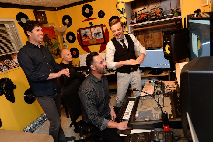 (Francisco Kjolseth | The Salt Lake Tribune) Members of The Piano Guys musical group, including videographer Paul Anderson, pianist Jon Schmidt, music producer Al van der Beek and cellist Steven Sharp Nelson, work on the possibilities for an upcoming show at their home studio in Sandy recently.