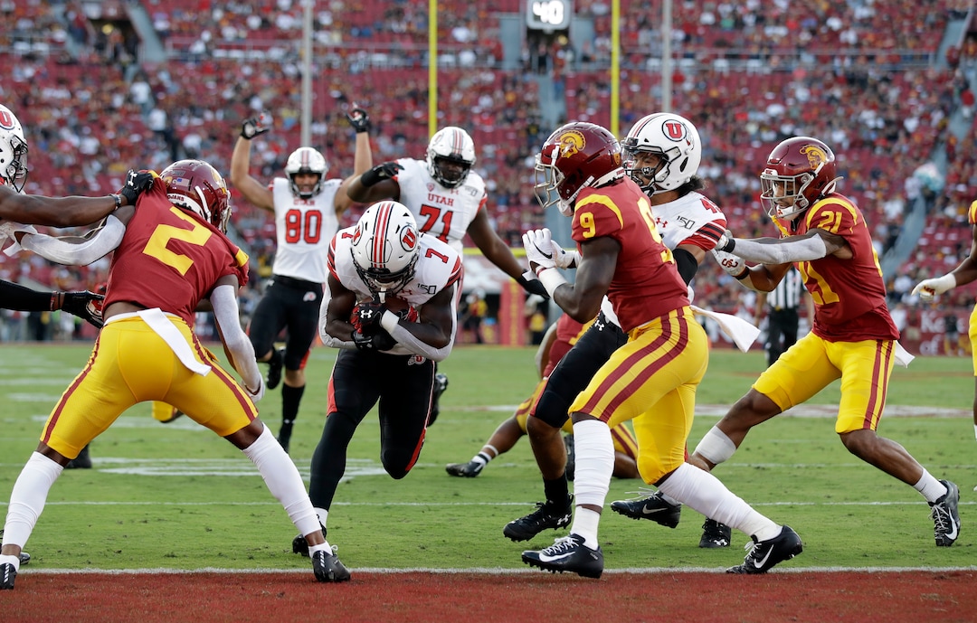 Utah running back Devonta'e Henry-Cole (7) runs in for a touchdown against Southern California during the first half of an NCAA college football game Friday, Sept. 20, 2019, in Los Angeles. (AP Photo/Marcio Jose Sanchez)