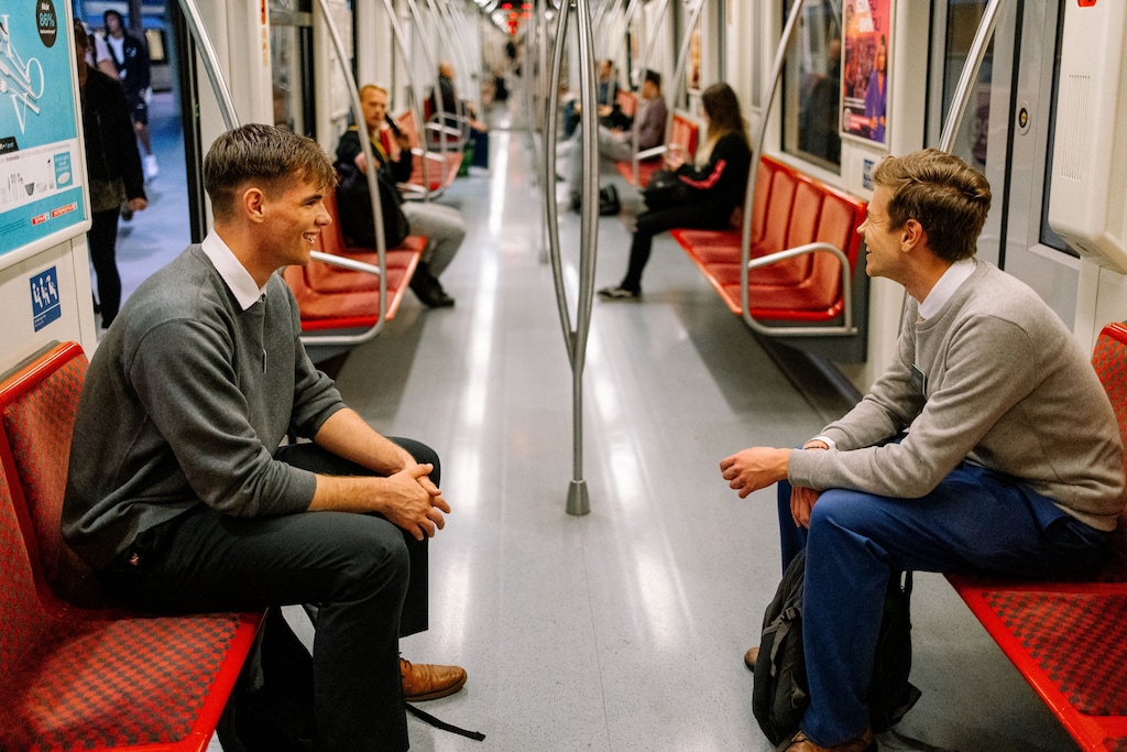 (The Church of Jesus Christ of Latter-day Saints) Missionaries ride transit in Hungary.