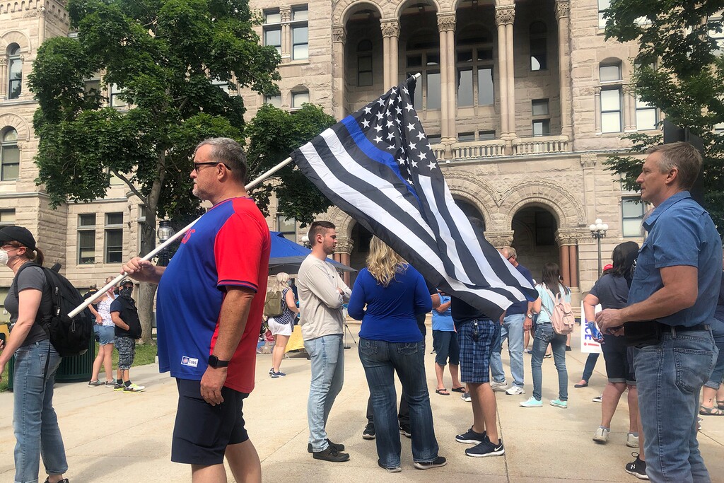 (Francisco Kjolseth  |  The Salt Lake Tribune) A crowd gathers to show support for police during a rally at Washington Square on June 20, 2020.