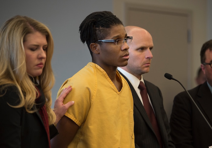 Scott Sommerdorf | The Salt Lake TribuneDefense attorney Lacey Singelton puts a hand on Gerald Grant's shoulder after he spoke to the victim's families and expressed his remorse. Grant was sentenced from 6 to 30 years for shooting and killing two men and a teenage boy inside an SUV in South Salt Lake nearly two years ago. Sentencing was in front of 3rd District Judge Vernice Trease, Thursday, March 8, 2018.