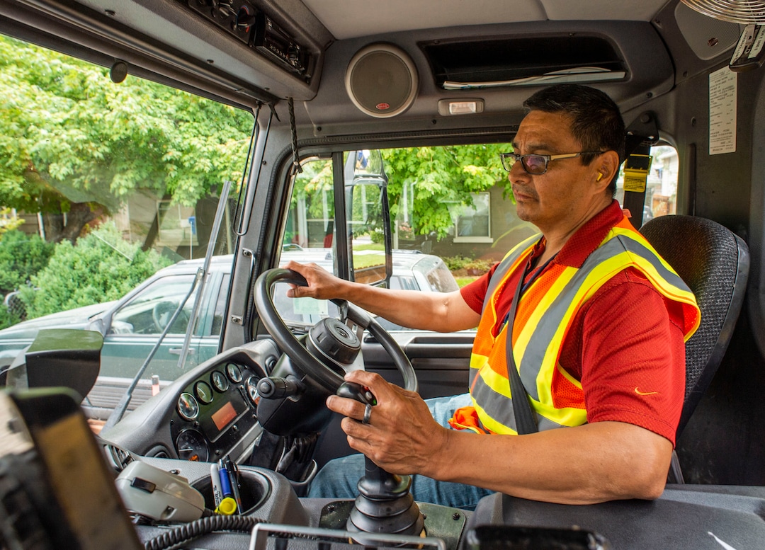 (Rick Egan  |  The Salt Lake Tribune) Steve Reyes checks the video screen to see what is coming out of the recycle cans as he collects recycled material in Sugarhouse for the Wasatch Front Waste and Recycling District on Friday, July 26, 2019.