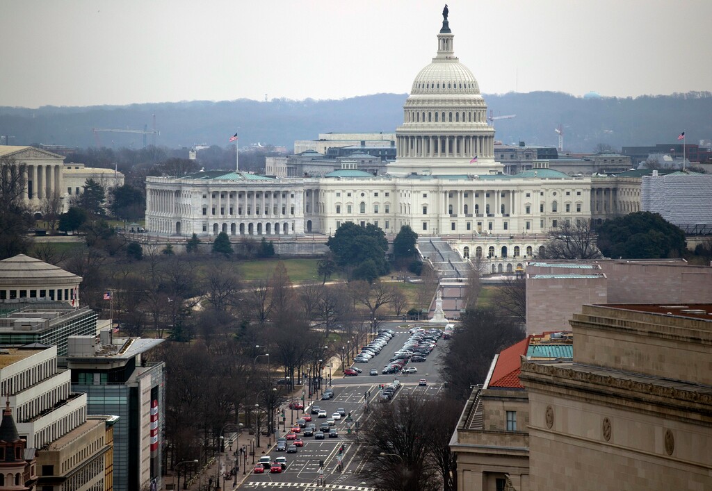 Pennsylvania Avenue leads to the U.S. Capitol as seen from the Old Post Office Pavilion Clock Tower, which remains open during the partial government shutdown, Friday, Jan. 4, 2019 in Washington. (AP Photo/Alex Brandon)