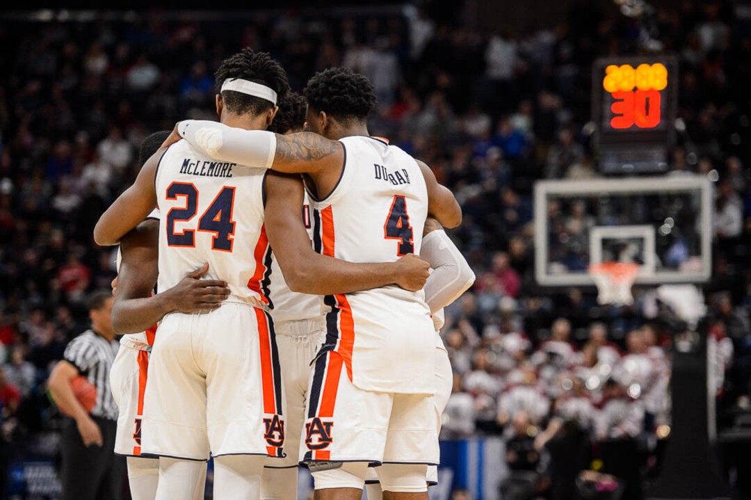 (Trent Nelson | The Salt Lake Tribune)  Auburn players huddle, facing New Mexico State in the 2019 NCAA Tournament in Salt Lake City on Thursday March 21, 2019.
