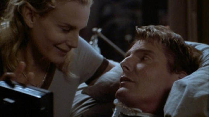 (courtesy photo) Christopher Reeve (right) and Daryl Hannah starred in "Rear Window," a 1998 TV movie remake of Alfred Hitchcock's classic thriller.