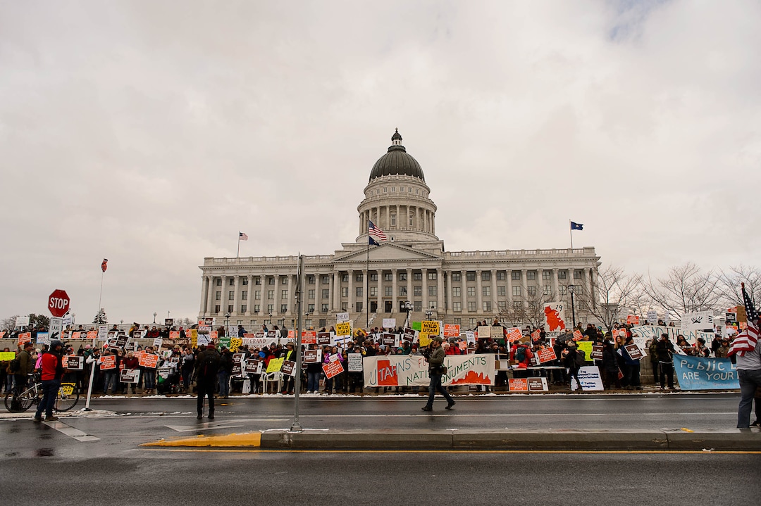 (Trent Nelson | The Salt Lake Tribune)  Protesters gather before a visit by President Donald Trump, Monday December 4, 2017.
