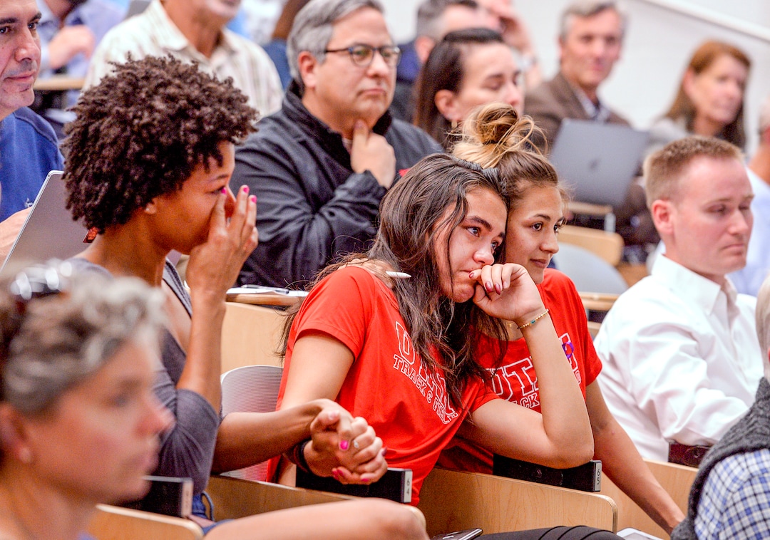 (Leah Hogsten  |  The Salt Lake Tribune) l-r University of Utah track and field alumni Alissa Atisme, freshman Ally Gomm and senior Brooke Martin console each other during the academic senate meeting Sept. 30, 2019 at the Henry Erying Building on campus.