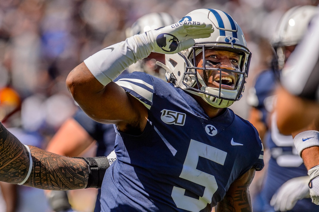 (Trent Nelson  |  The Salt Lake Tribune)  
Brigham Young Cougars defensive back Dayan Ghanwoloku (5)  celebrates a touchdown as BYU hosts USC, NCAA football in Provo on Saturday Sept. 14, 2019.