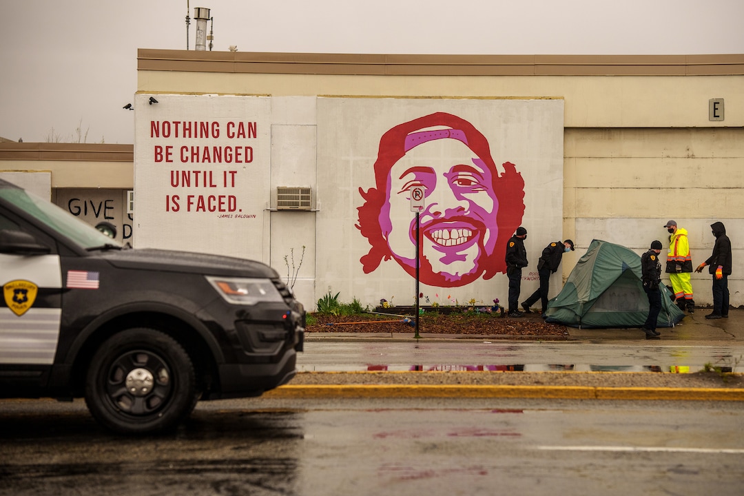 (Trent Nelson  |  The Salt Lake Tribune) Salt Lake County conducts a camp cleanup at the Fleet Block Murals in Salt Lake City on Wednesday, April 14, 2021.