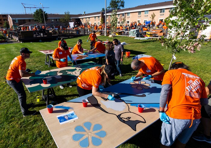 (Rick Egan | The Salt Lake Tribune) More than 600 volunteers, led by Home Depot employees, help spruce up the Sunrise Metro and Freedom Landing apartments in Salt Lake City on Wednesday, Sept. 21, 2022.