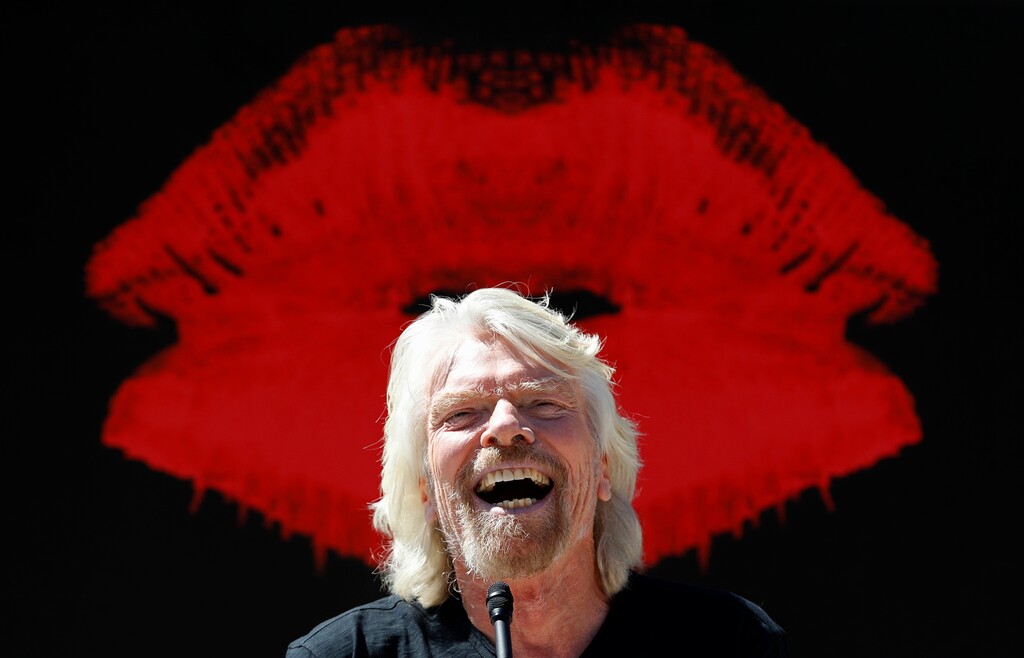 (John Locher | The Associated Press) Virgin Group founder Richard Branson speaks at a news conference Friday, March 30, 2018, in Las Vegas. Virgin Hotels announced that it had bought the Hard Rock hotel and casino in Las Vegas.