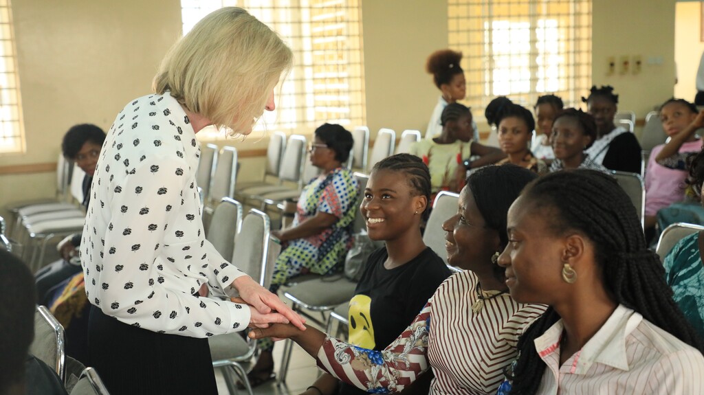 (Photo courtesy of The Church of Jesus Christ of Latter-day Saints) Young Women General President Bonnie H. Cordon meets a group of young women in Lagos, Nigeria, in March 2019.