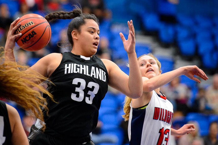 (Trent Nelson | The Salt Lake Tribune)  Highland's Lana Olevao (33) pulls in a rebound with Woods Cross's Sara Noel (13) nearby as Woods Cross faces Highland in the 5A High School Girls' Basketball Tournament at SLCC in Taylorsville, Wednesday Feb. 21, 2018.