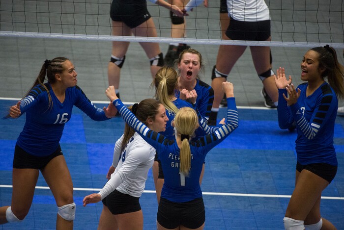 (Rick Egan  |  The Salt Lake Tribune)  The Pleasant Grove Vikings celebrate as they lead Lone Peak  in championship volleyball action, Pleasant Grove vs. Lone Peak, at Utah Valley University, Saturday, November 4, 2017.