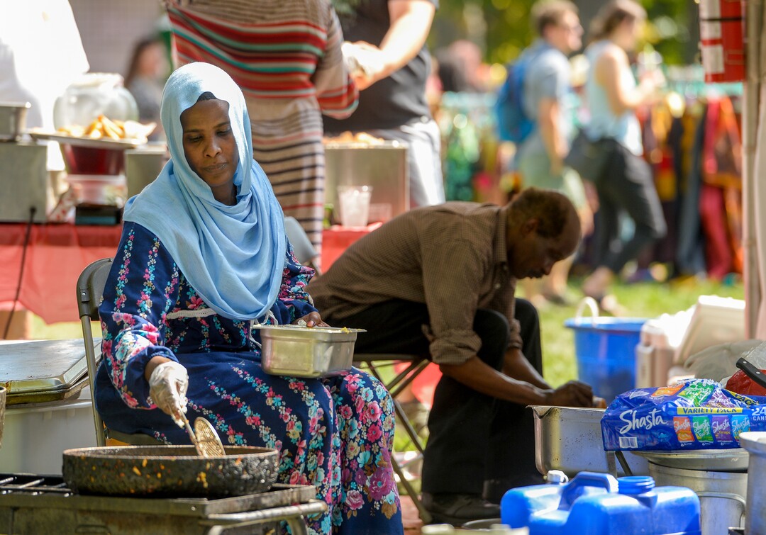 (Leah Hogsten  |  The Salt Lake Tribune)  Rabab Omer frys falafel and other Sundanese foods during the 4th Annual African Festival sponsored by the United Africans of Utah, Saturday, July 27, 2019 at Liberty Park. The African Festival promotes African tradition, culture and heritage through the arts, food fashion, music and dance.