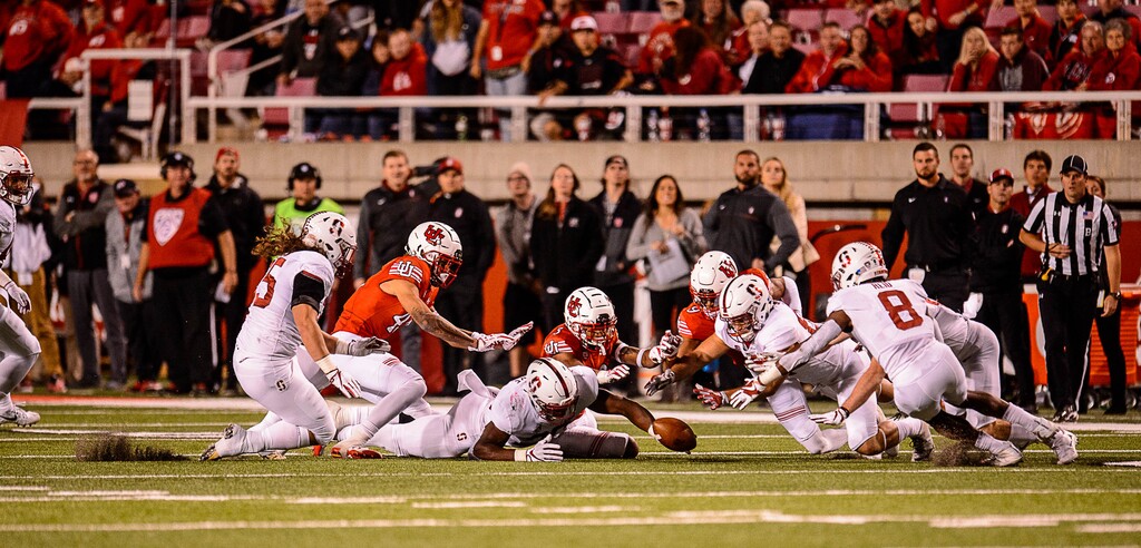 (Trent Nelson | The Salt Lake Tribune) Utah and Stanford players dive for an onside kick in the final minute as the University of Utah hosts Stanford, NCAA football at Rice-Eccles Stadium in Salt Lake City Saturday October 7, 2017.